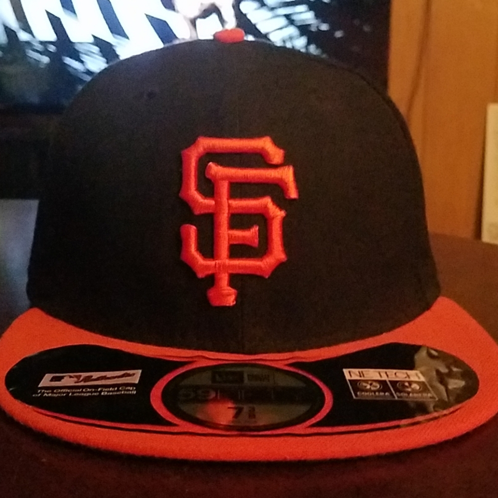 San Francisco Giants fitted cap.